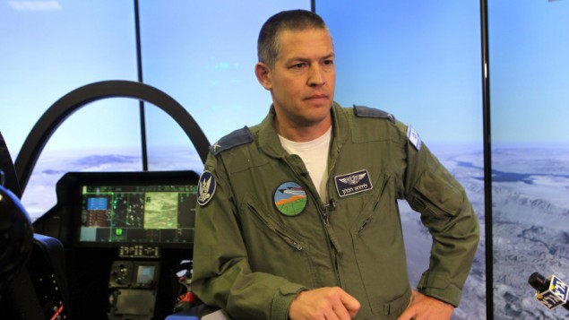 Brig. Gen. Lihu HaCohen, commander of the Nevatim Air Base, alongside a demo F-35 simulator (photo credit: Flash 90)