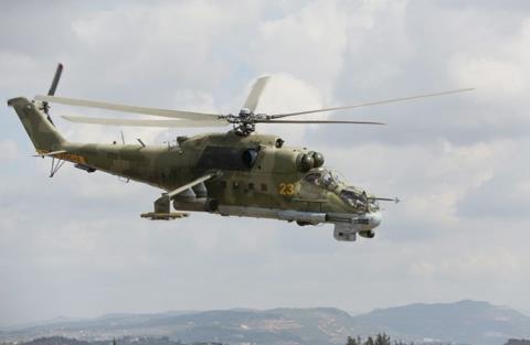 
Trực thăng Mi-24 của Nga tấn công quân khủng bố ở Syria - Ảnh: TASS.
