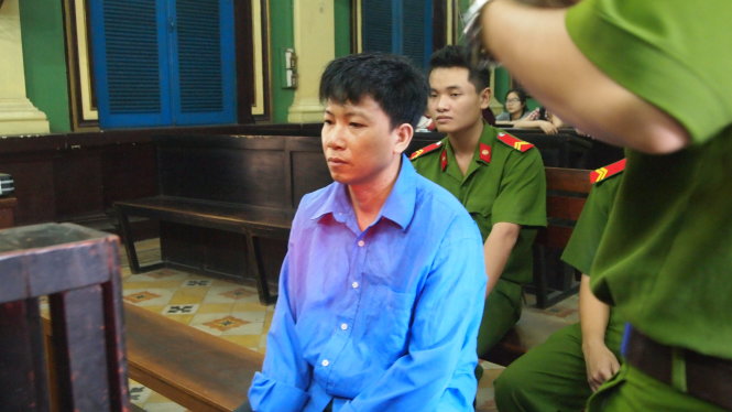 Bị cáo Nguyễn Quang tại phiên xét xử ngày 23-3 - Ảnh: H.Điệp/Tuổi trẻ