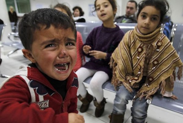 
Ánh mắt sợ hãi của trẻ em ở Syria.
