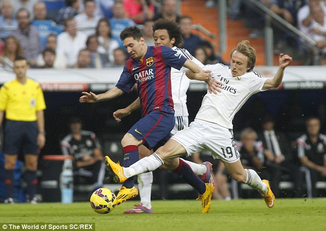 Sự trở lại của Modric sẽ mang tới nhiều nét khởi sắc cho tuyến tiền vệ Real. Ảnh: Daily Mail.