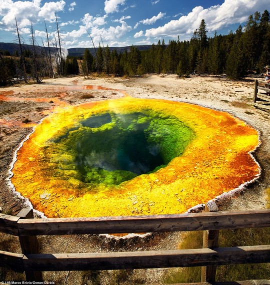 Pool on fire! The fierce colours are influenced by how light interacts with the water’s depth, with yellow and orange colours in the shallows and green in the deep waters