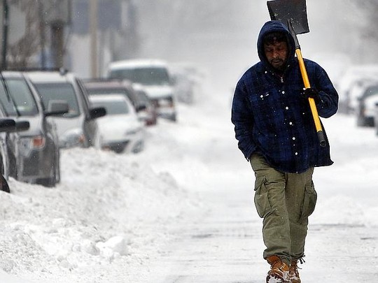 Not that bad ... A man walks down an empty street during what would normally be the morni