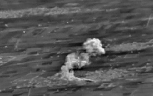 
Máy bay chiến đấu của Nga không kích trúng sở chỉ huy của IS tại tỉnh Raqqa, Syria ngày 9/10. (Ảnh: Reuters).
