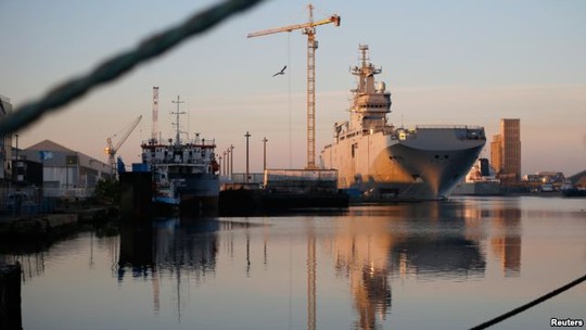 FILE - The Mistral helicopter assault ship Vladivostok, which Russia ordered from France, is seen at Frances Atlantic port of Saint-Nazaire, Sept. 4, 2014.