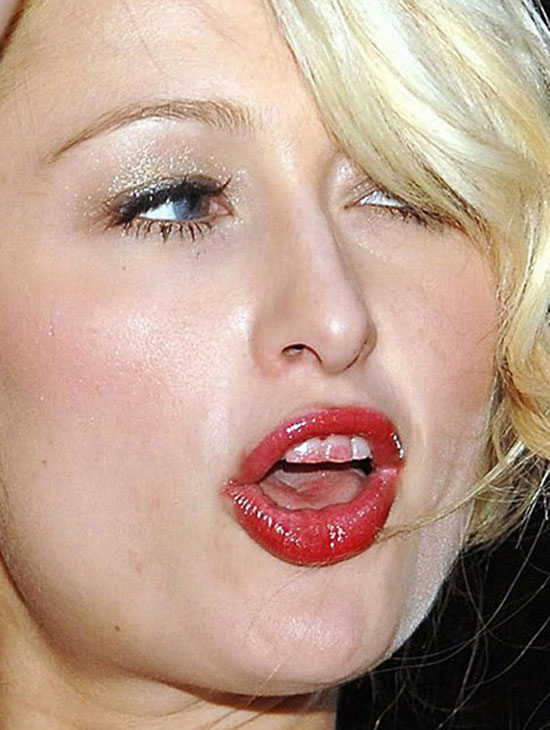 Răng và lưỡi của người đẹp Paris Hilton dính đầy son.