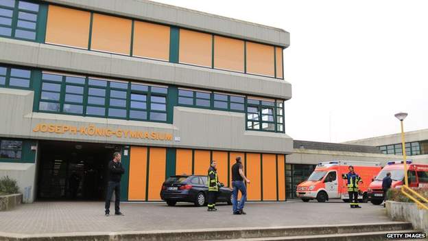 Police outside Joseph-Koenig secondary school in Haltern am See, where a number of victims are said to have attended