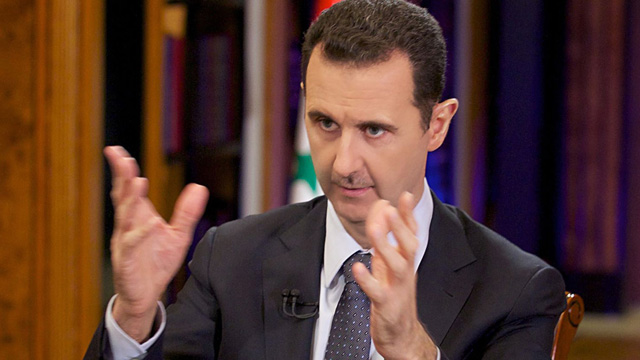 
Với phe ủng hộ chế độ, sự tồn tại của Assad là phương án chắc chắn nhất để tránh một tương lai đen tối. Ảnh: The Guardian
