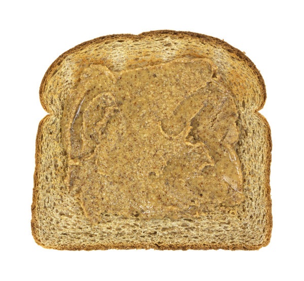 
Một lát bánh mì làm từ ngũ cốc nguyên hạt kèm bơ hạnh nhân
