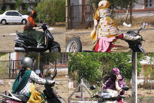 Phụ nữ Ấn Độ khi ra đường đeo gang tay, chùm kín và quấn đầu