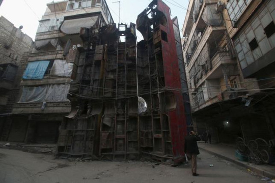 Khu phố Bustan al-Qasr ở Aleppo cũng do phiến quân kiểm soát. Ảnh: Reuters