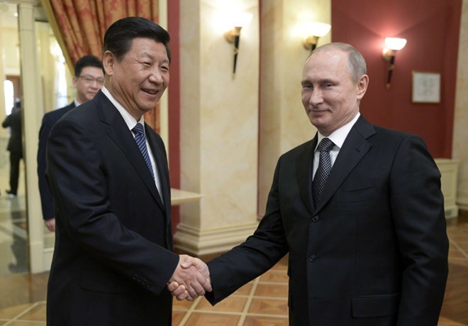 Chủ tịch Trung Quốc Tập Cận Bình và Tổng thống Nga Putin (bên phải).
