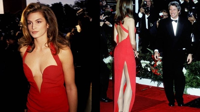 
Siêu mẫu Cindy Crawford trên thảm đỏ lễ trao giải Oscar 1991 cùng người chồng đầu tiên - Richard Gere. Chiếc váy đỏ Versace mà cô mặc đã trở thành cảm hứng cho nhiều hãng thời trang sau này.
