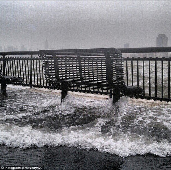 October 29th: Hurricane Sandy's descent upon the East Coast came in as number eight on their list, with this flooded bench overlooking the Hudson River from New Jersey pictured