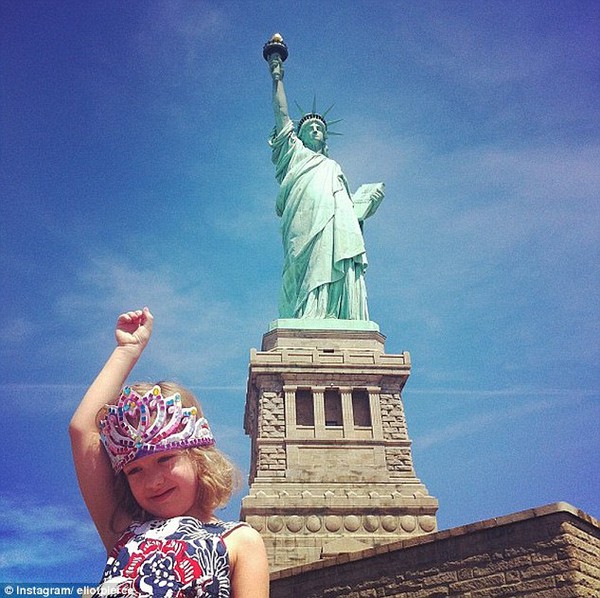 July 4th: This photo of a little girl posing before the Statue of Liberty in New York City earned second place on their list for the U.S.' Independence Day