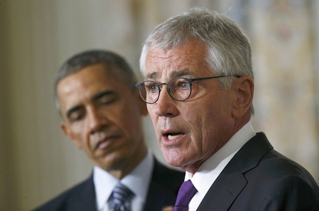 Ông Hagel vẫn tạm thời giữ chức bộ trưởng quốc phòng đến khi ông Obama tìm được người thay thế - Ảnh: Reuters