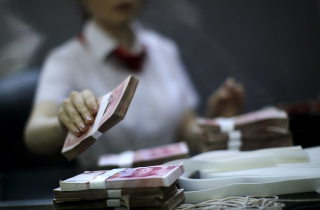 Trung Quốc đang thúc đẩy những biện pháp tăng cường ảnh hưởng cho đồng nhân dân tệ trên thị trường quốc tế Ảnh: Reuters