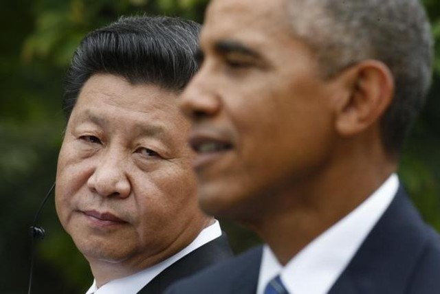 
Chủ tịch Trung Quốc Tập Cận Bình (trái) trong cuộc họp báo chung với Tổng thống Mỹ Barack Obama tại Nhà Trắng hôm 25/9. Ảnh: Reuters
