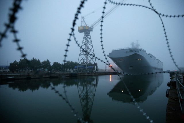 The Mistral-class helicopter carrier Vladivostok is seen at the STX Les Chantiers de l&apos;Atlantique shipyard site in Saint-Nazaire