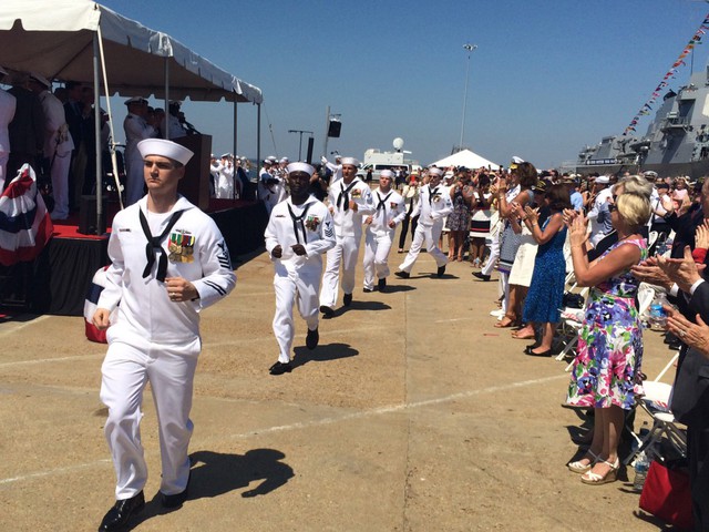 NORFOLK, Va. (Aug. 1, 2015) Sailors assigned to the Virginia-class attack submarine, USS John Warner (SSN 785), prepare to man the ship and bring it to life during the commissioning ceremony for the boat at Naval Station Norfolk August 1. John Warner is the U.S. Navys 12th Virginia-class submarine. (U.S. Navy photo by Chief Mass Communication Specialist Monique Meeks/Released)