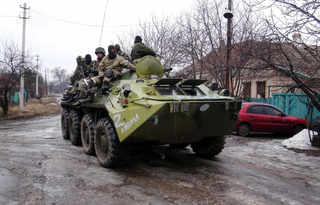 Ly khai Ukraine tuyên bố không rút vũ khí hạng nặng khỏi vùng giao tranh nếu quân đội Kiev không thực hiện đúng thỏa thuận ngừng bắn. Ảnh: TASS.