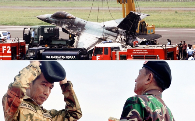 Một chiếc máy bay chiến đấu F-16 của quân đội Indonesia được xe cứu hộ đưa đi sau khi bốc cháy trước khi cất cảnh.