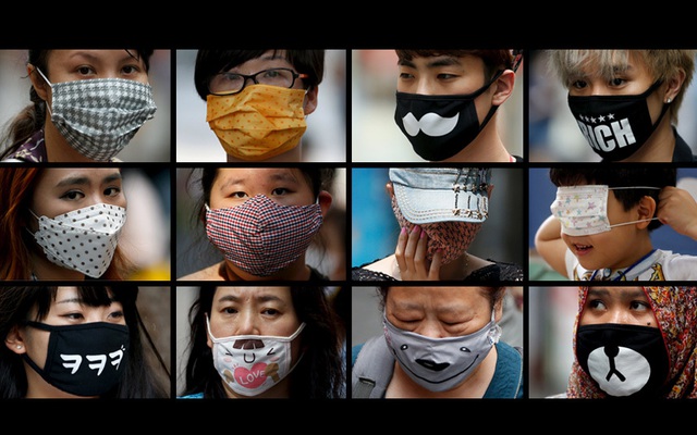 Mọi người đeo khẩu trang để phòng tránh dịch MERS tại thành phố Seoul, Hàn Quốc.