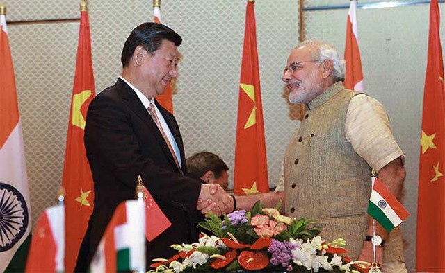 Sự trỗi dậy về mặt kinh tế của Trung Quốc và Ấn Độ đang cân bằng lại cán cân quyền lực toàn cầu. Ảnh: AFP