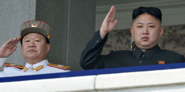 Choe Ryong Hae bên cạnh lãnh đạo Kim Jong Un. Ảnh: AP
