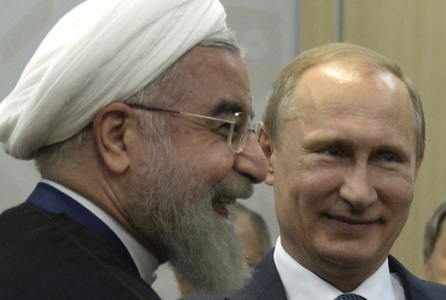 Tổng thống Nga Vladimir Putin (phải) gặp người đồng cấp Iran Hassan Rouhani tại Ufa, Nga hôm 9/7. Ảnh: Reuters.