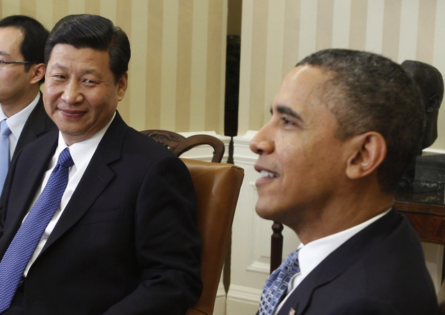 Ông Tập Cận Bình (trái) gặp Tổng thống Mỹ Barack Obama tại Nhà Trắng hồi năm 2012, khi ông Tập còn là phó Chủ tịch Trung Quốc. Ảnh: Reuters.