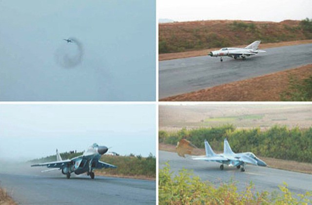 
Tiêm kích MiG-21 và MiG-29 của Triều Tiên tập cất hạ cánh trên đường giao thông dân sự, phục vụ cho trường hợp dự phòng sân bay bị đánh phá trong chiến tranh (Ảnh năm 2014).
