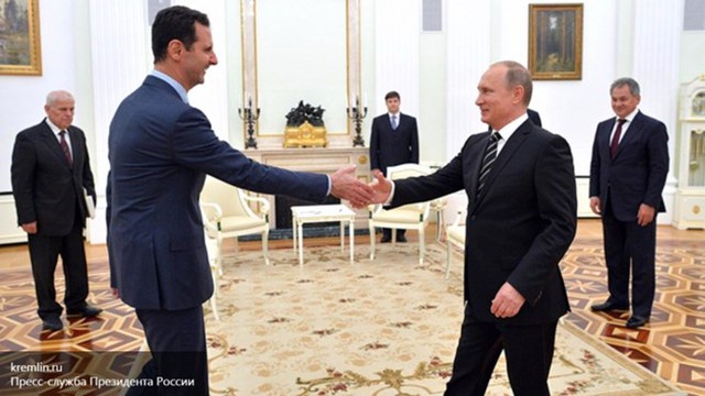 
Tổng thống Nga Putin và Tổng thống Syria al-Assad (Bên trái).
