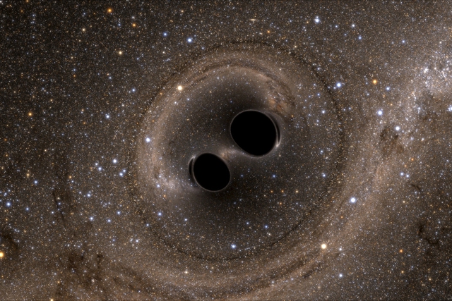 Hình ảnh hai lỗ đen khổng lồ va chạm với nhau được chụp từ mô phỏng dựng trên máy tính.