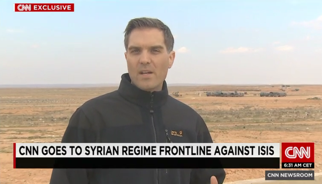 
Phóng viên CNN đưa tin trực tiếp từ chiến trường Syria.
