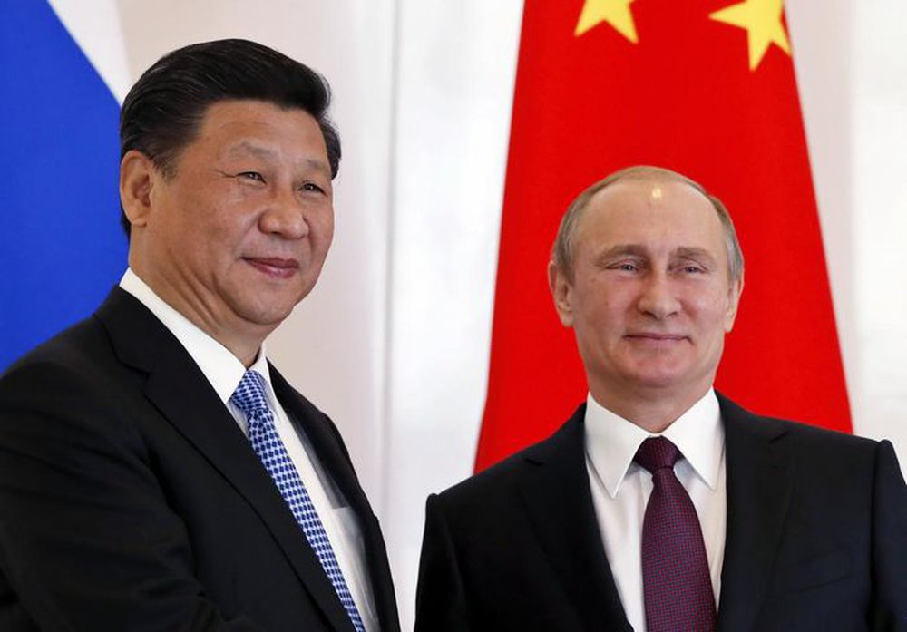 Yếu tố Mỹ thúc đẩy Nga và Trung Quốc xích lại gần nhau - Ảnh 1.