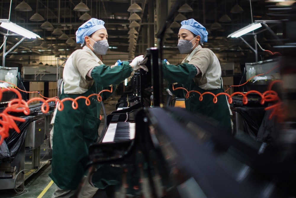 Bên trong nhà máy sản xuất đàn piano khổng lồ của Trung Quốc - Ảnh 9.