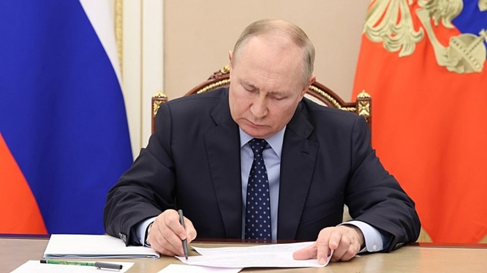 Tổng thống Putin ký ban hành luật sáp nhập 4 vùng Ukraine vào Nga - Ảnh 1.