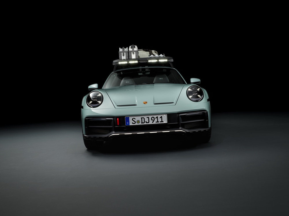 Porsche 911 Dakar ra mắt: Xe sang của nhà giàu thích nghịch cát - Ảnh 10.