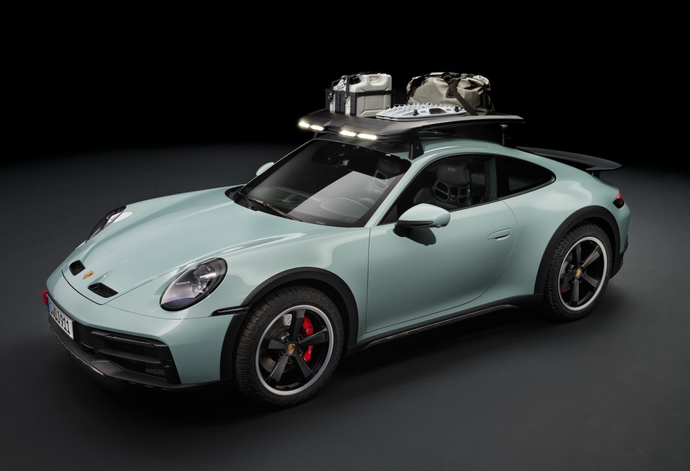 Porsche 911 Dakar ra mắt: Xe sang của nhà giàu thích nghịch cát - Ảnh 9.