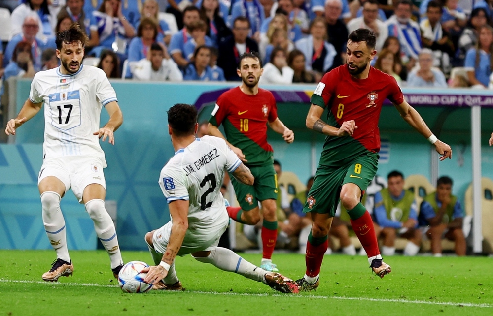 TRỰC TIẾP Bồ Đào Nha 1 - 0 Uruguay: Cột dọc cứu thua cho Seleccao - Ảnh 1.