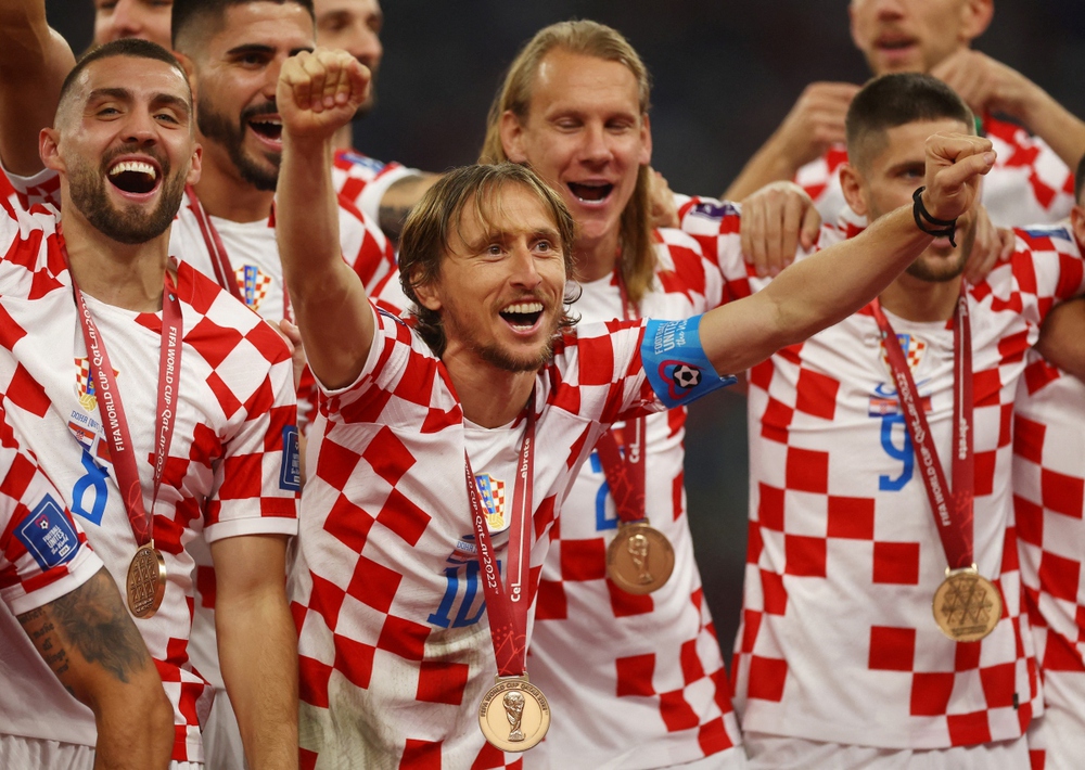 Luka Modric chia tay World Cup với nụ cười mãn nguyện - Ảnh 1.