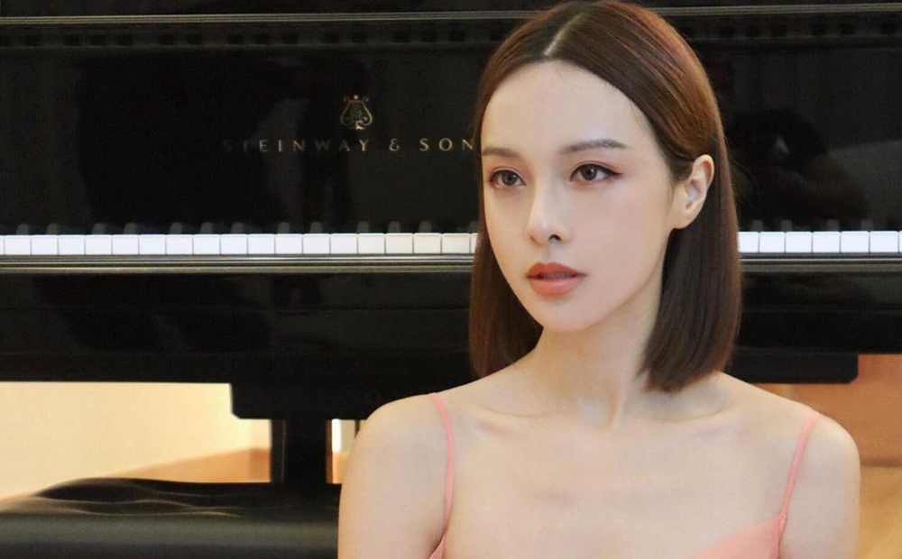 Nhan sắc của cô gái được mệnh danh là "nữ thần piano châu Á": Mặt đẹp đến vô thực, body còn siêu gợi cảm