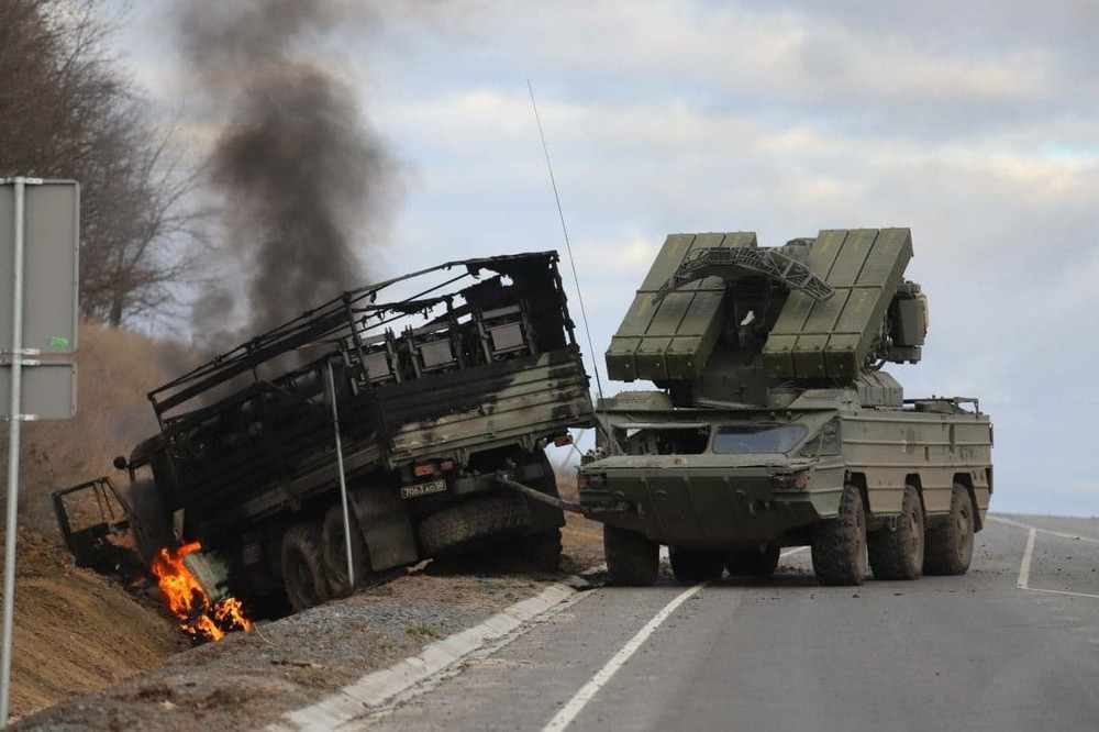 A convoy of Russian military vehicles catches fire after being ambushed in the early days of the fighting in Ukraine.