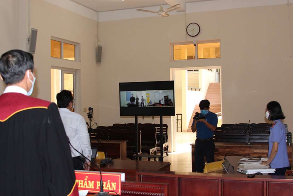 How did the first online trial in Binh Duong take place?  - Photo 1.