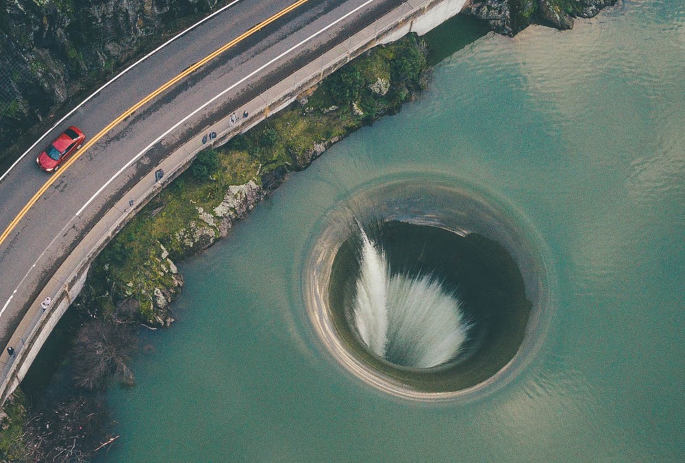 Not a Photoshop image, these water holes are real on Earth, but where do they flow?  - Photo 3.