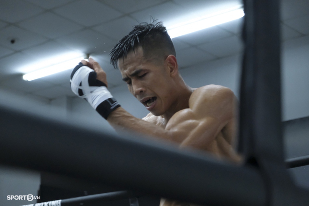 Võ sĩ boxing Trần Văn Thảo vượt cái nóng, tăng tốc cho SEA Games 31 - Ảnh 7.