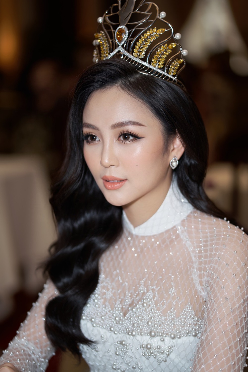 Hoa khôi Hải Yến xuất hiện xinh đẹp với áo dài trắng tại sự kiện - Ảnh 4.