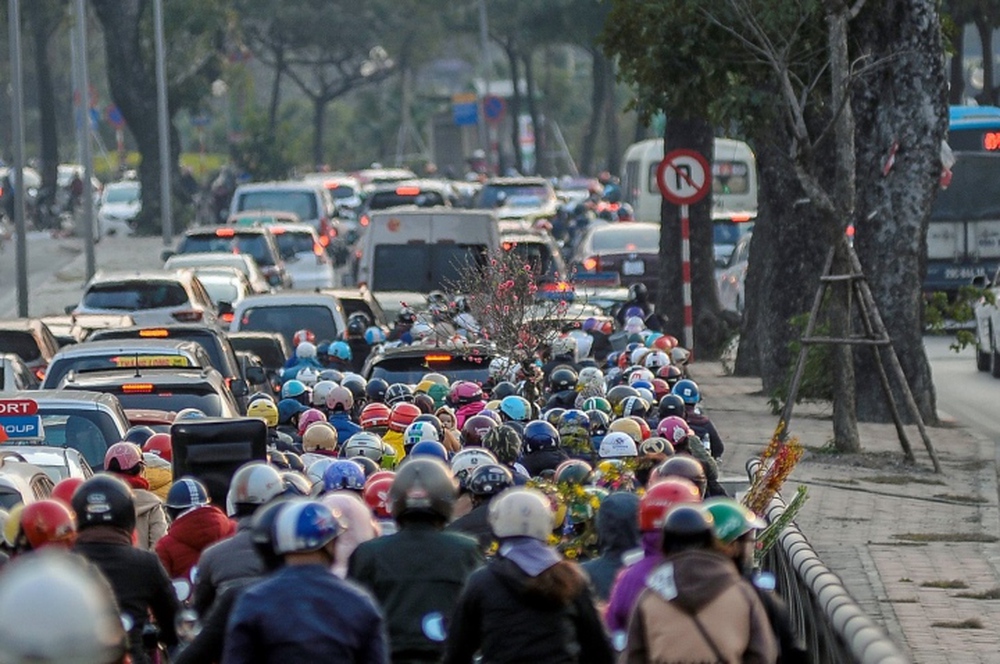 Mẹo tr&aacute;nh tắc đường khi trở lại th&agrave;nh phố sau kỳ nghỉ Tết Dương lịch 2023 - Ảnh 1.