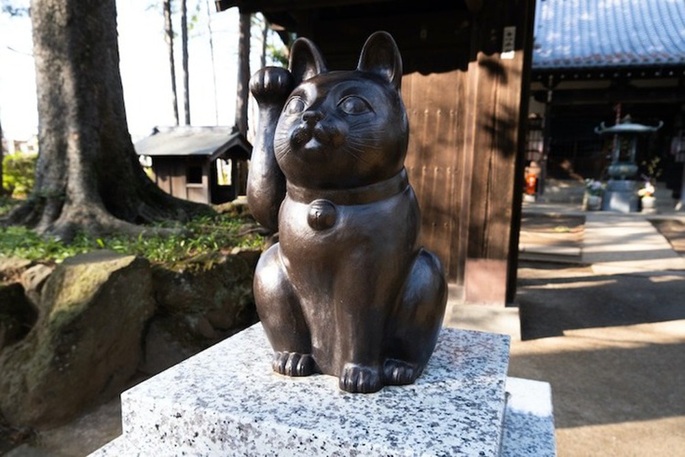 Câu chuyện thú vị về nguồn gốc ra đời tượng mèo Maneki-neko may mắn nổi tiếng của Nhật Bản - Ảnh 7.